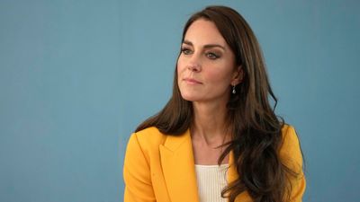 Kate Middleton's bright yellow LK Bennett blazer adds the perfect pop of color to her all-white outfit