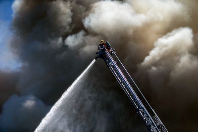 4 rescued in major fire in downtown Portland, Oregon, before firefighters pulled back as blaze rages