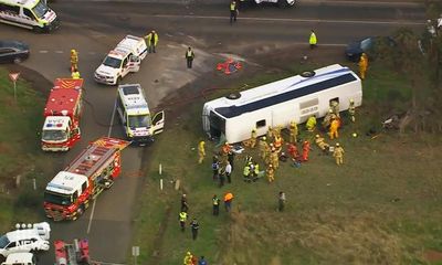 Melbourne bus crash: truck driver released on bail after several school children injured