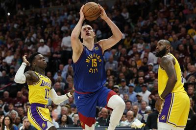 Jokic dominates as Nuggets hold off Lakers in opener