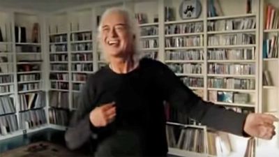 A happy Jimmy Page playing air guitar is today's fix of wholesome video goodness