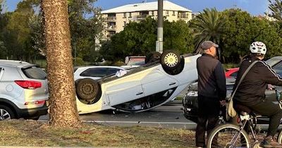 Car flipped on Newcastle road during peak hour traffic