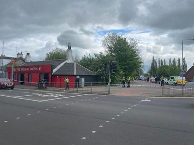 Man rushed to hospital after Glasgow pub taped off following fire