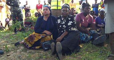 Hippo charges at canoe before capsizing boat with 24 feared dead including baby