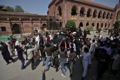 Ex-Pakistan PM Khan says police surround his house, fears re-arrest