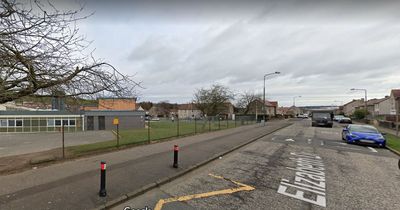 Man rushed to hospital with serious head injury following violent attack near school