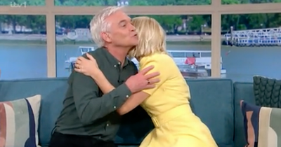 Holly Willoughby and Phillip Schofield share awkward hug as she departs This Morning studio