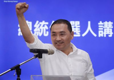Taiwan opposition party picks New Taipei mayor, a former police chief, as its presidential candidate