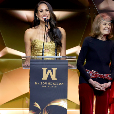Meghan Markle Sparkled in a Gold Gown as She Accepted a Woman of Vision Award