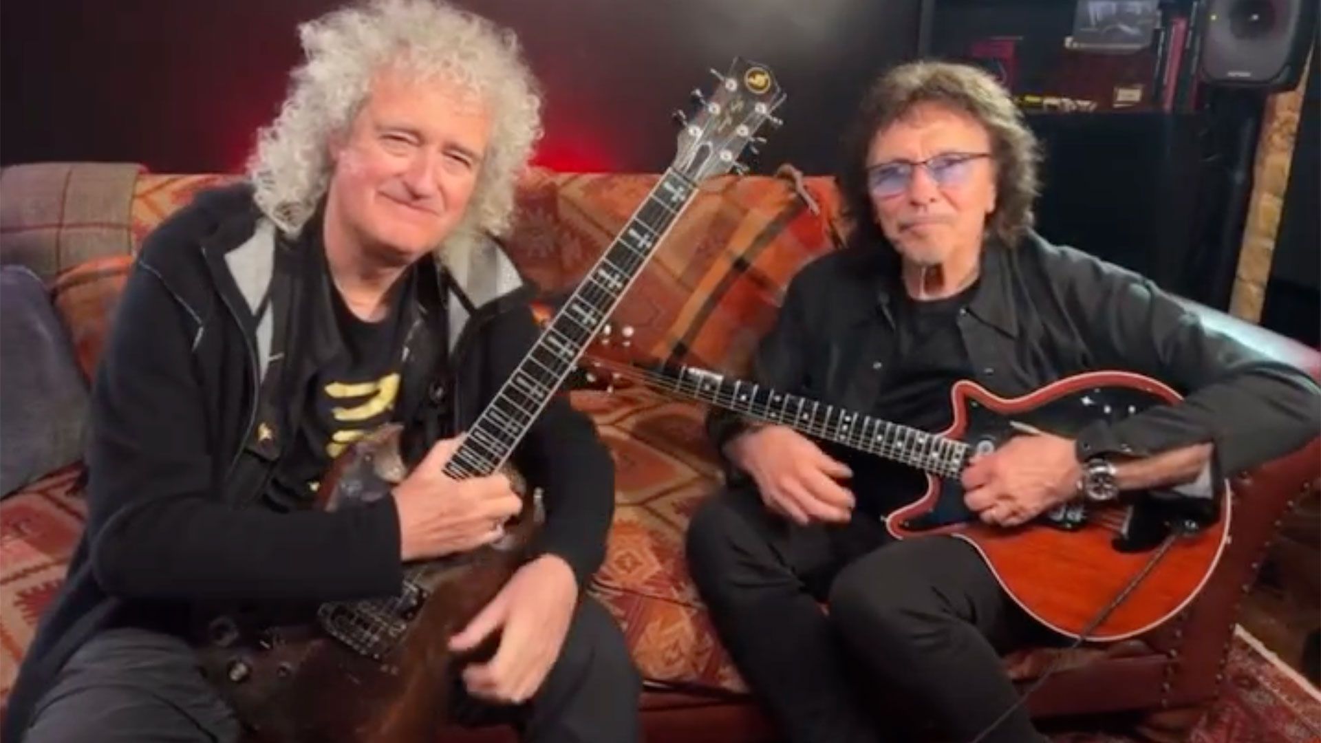 Tony Iommi trades guitars with Brian May and faces the…