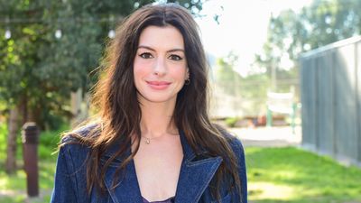 Anne Hathaway makes a strong case for slicked back hair in Venice