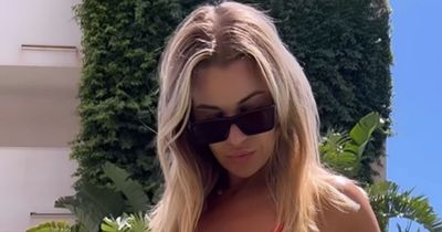 Christine McGuinness compared to Pamela Anderson in red swimsuit as she says it 'feels like a dream'