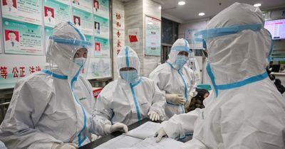 China 'tried to keep Covid outbreak a secret' and first death earlier than believed