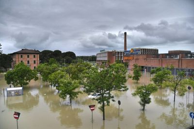 Nine dead, Grand Prix cancelled after flooding devastates northern Italy