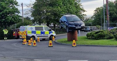 Stolen motor found perched on metal cylinder on roundabout in Scots town