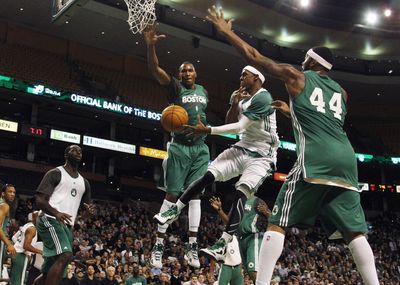 Who has the highest assist average in Boston Celtics playoff history?