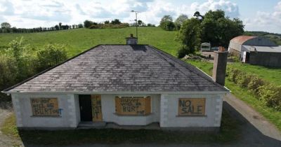 Bungalow costs just £130,000 but comes with ominous message painted on the windows