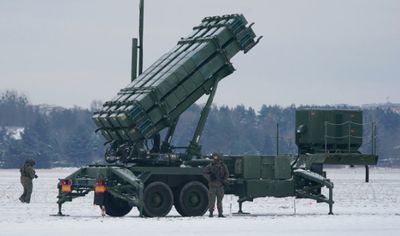 Kyiv weathers 'unprecedented' wave of missiles