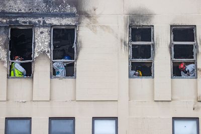 Man arrested and charged with arson over ‘once-in-a-decade’ fire at New Zealand hostel