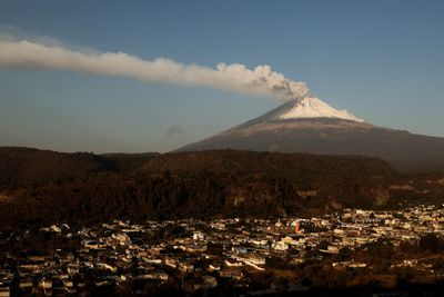 Mexican volcano near capital spews more ash, forcing school closures