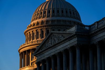 Most say pair debt limit increase with deficit cuts, but few following debate closely: AP-NORC poll