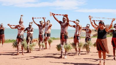 Mornington Island residents thrilled to welcome first international tourists on cruise ship