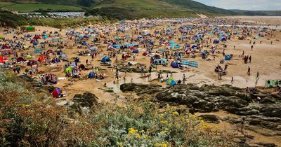 Tourists fume over 'too much sand' and 'not enough sea' on West Country beach