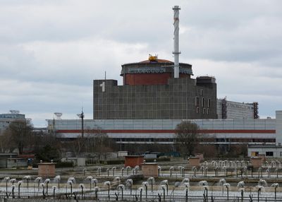 Russian forces dig in at Ukrainian nuclear plant, witnesses say