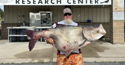 Man shocked as he catches enormous 'alien fish' the size of a 14-year-old