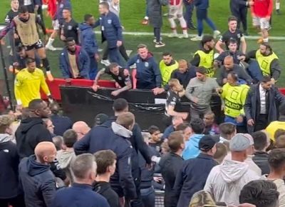 West Ham players brawl as AZ Alkmaar supporters attack - and one Hammers fan keeps dozens at bay