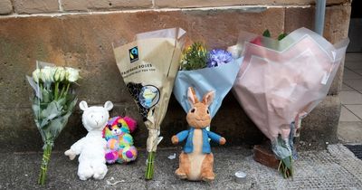 Teddy bears and floral tributes left for Scots boy, 4, outside flat where dad killed him