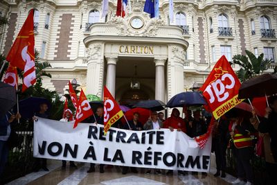 Away from the Cannes glamour, hospitality staff protest over harsh conditions