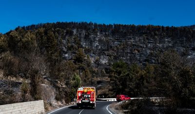 Spain says containing wildfire as conditions improve