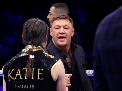 Conor McGregor cheers on Katie Taylor from ringside during Chantelle Cameron fight