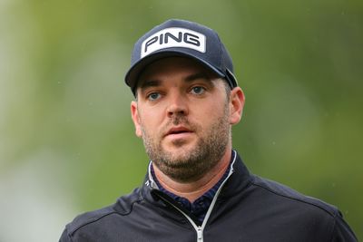 Conners grinds to PGA lead as Rose charges at rainy Oak Hill