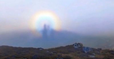 Natural optical illusion sees 'ghost' appear on top of mountain in eerie footage