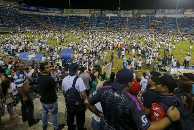 Authorities investigate El Salvador stadium crush with at least 12 people dead