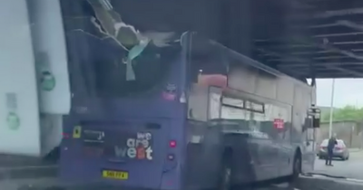 10 rushed to hospital after Glasgow bus crashes into bridge with roof ripped off