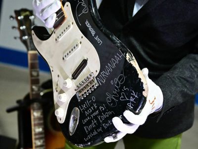 Kurt Cobain's broken guitar sells for nearly $600,000