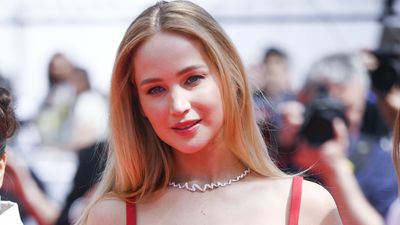 Jennifer Lawrence stuns in beautiful red gown at Cannes - but it's her shocking choice of footwear that we really love