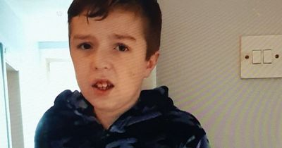 Huge police presence on Scots street as 'vulnerable' schoolboy reported missing