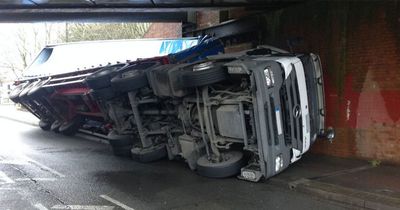 Lorry flips after striking rail bridge in Glasgow cancelling train services