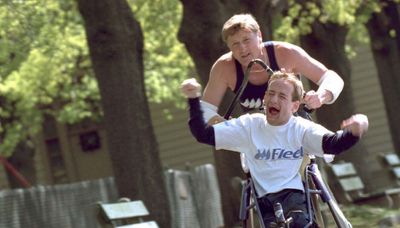 Rick Hoyt, a Boston Marathon fixture with father pushing his wheelchair, has died at 61