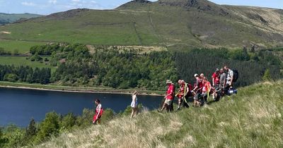 Walker stretchered to safety after suffering suspected broken ankle at Dovestones
