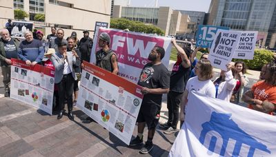 Workers’ rights groups protest restaurant industry convention at McCormick Place
