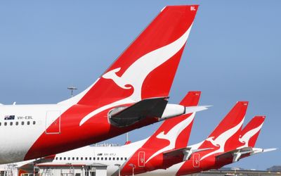 Qantas reports record profit, plans more flights