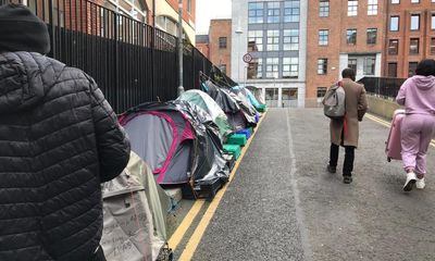 Refugees huddle together in Dublin camp as local tensions rise