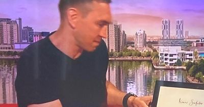 Kevin Sinfield overcome with emotion receiving gift commemorating the iconic moment he shared with Rob Burrow