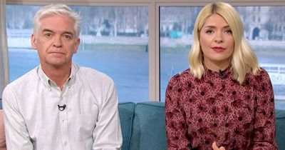 Holly v Phil: Daytime TV WAR as co-stars and pals draw battlelines and declare allegiances