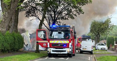 Neighbours evacuated after blaze and 'gas explosion' on quiet residential street